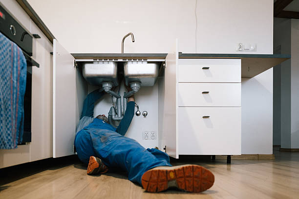 Professional Plumbing technician working in Lakemore, OH